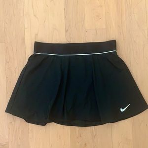 Nike black tennis skirt with built-in shorts.